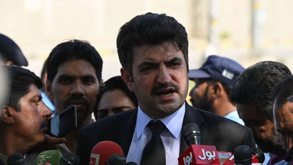 Sher Afzal Marwat speaking at a podium with the text 'Exposing Masked Men's Raid: Islamabad High Court Reacts' in the background.